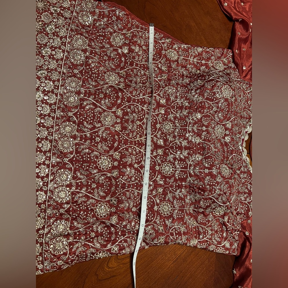 Elegant rust color lehenga with long top with crystal work - Picture 3 of 15